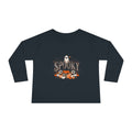 Black toddler long sleeve graphic tee with a smiling ghost and pumpkin patch Halloween print